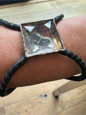 Vintage Statement Cuff with feather inside crystal and leather wrapped bands